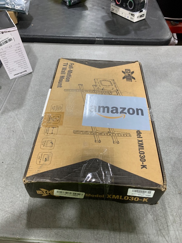 Photo 1 of USX MOUNT Full Motion TV Wall Mount for 42-80 Inch TVs up to 120lbs, Wall Mount TV Bracket with Articulating Swivel Tilt Extension Leveling, Max VESA 600x400mm Fits 12/16" Wood Stud
