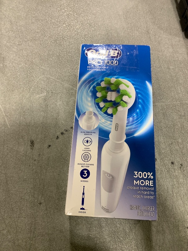 Photo 1 of Oral-B Pro 1000 Rechargeable Electric Toothbrush, White