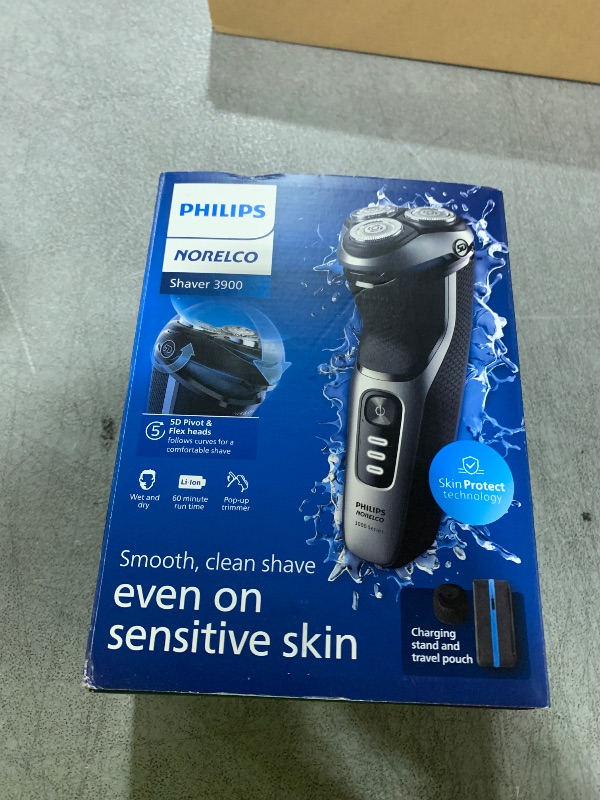 Photo 1 of Philips Norelco Shaver 3900 Series, Wet and Dry Electric Shaver, P-Cap, Travel Pouch, Charging Stand, Storm Blue, Model S3341/92