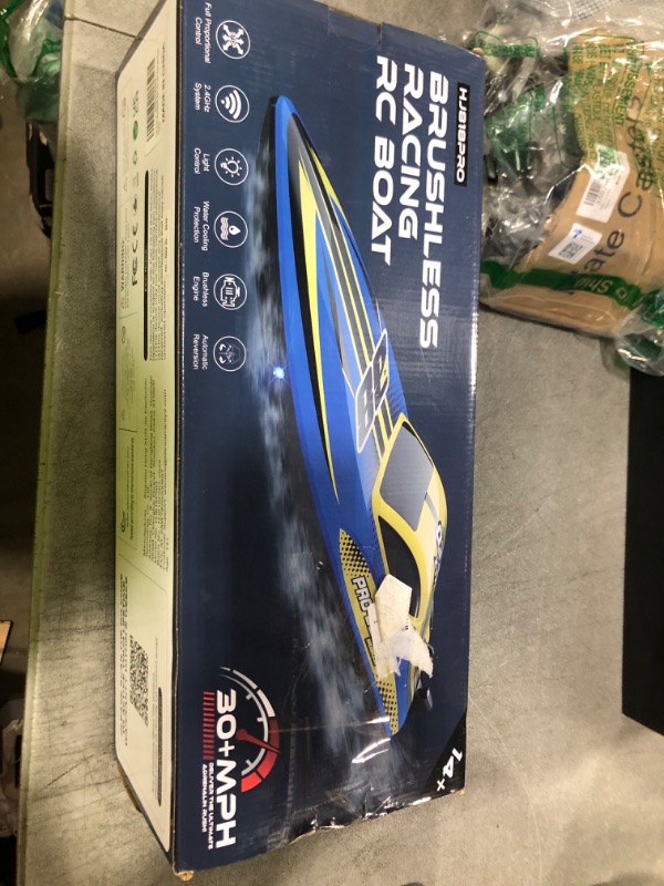 Photo 1 of TOPCHOIC Brushless RC Boat 30+MPH, Big Remote Control Boats for Adults and Kids, Fast Racing Boat with Self-Righting, LED Lights, Waterproof, RTR, Sailboat for Lake, River, Saltwater and Pools