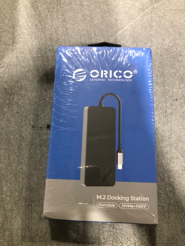 Photo 1 of ORICO USB-C Hub with M.2 SSD Enclosure, 8-in-1 USB C Docking Station Fits M.2 NVMe/SATA SSD, 10Gbps, 4K@60Hz HDMI, 100W PD, SD/TF Card Reader - OM28P