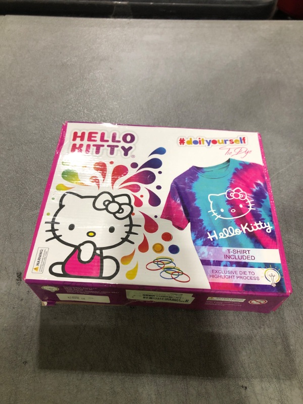 Photo 1 of INNOVACTION TOYS – Hello Kitty - Tie Dye Set - Set Includes with a T-Shirt, 3 Colored Paints, Lining, Gloves and Elastic Bands, Pack of 1 (XXL)
