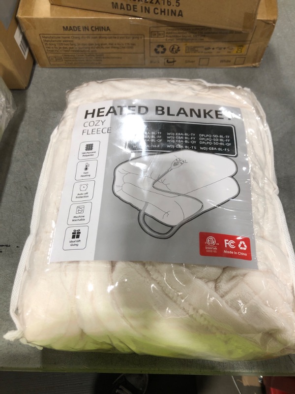 Photo 1 of Electric Heated Blanket 72" x 84" Full Size Breathable Warm Flannel Heated Blanket with 4 Heating Levels & 10 Hours Auto Shut Off, Control Temperature and Washable, for Sofa and Bed White
