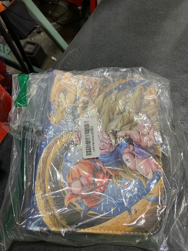 Photo 1 of Anime Trading Card Binder for Dragon Cards, 4 Pocket with 50 Sleeves up to 400 Cards TCG Card Binder, Waterproof Card Storage Book, Cards Display Case (Goku Super Saiyan 3 Dragon Fist)