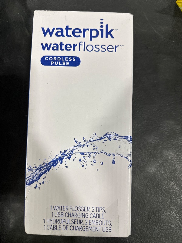 Photo 1 of Waterpik Cordless Pulse Rechargeable Portable Water Flosser for Teeth, Gums, Braces Care and Travel with 2 Flossing Tips, Waterproof, ADA Accepted, WF-20 Gray, Packaging May Vary