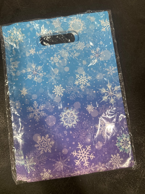 Photo 1 of 50 Pcs Winter Snowflake Party Favor Bags, Blue and Purple Snowflake Goodie Bags Bulk with Handles, Holiday Plastic Gift Candy Bag for Birthday Christmas Winter Wonderland Party Supplies