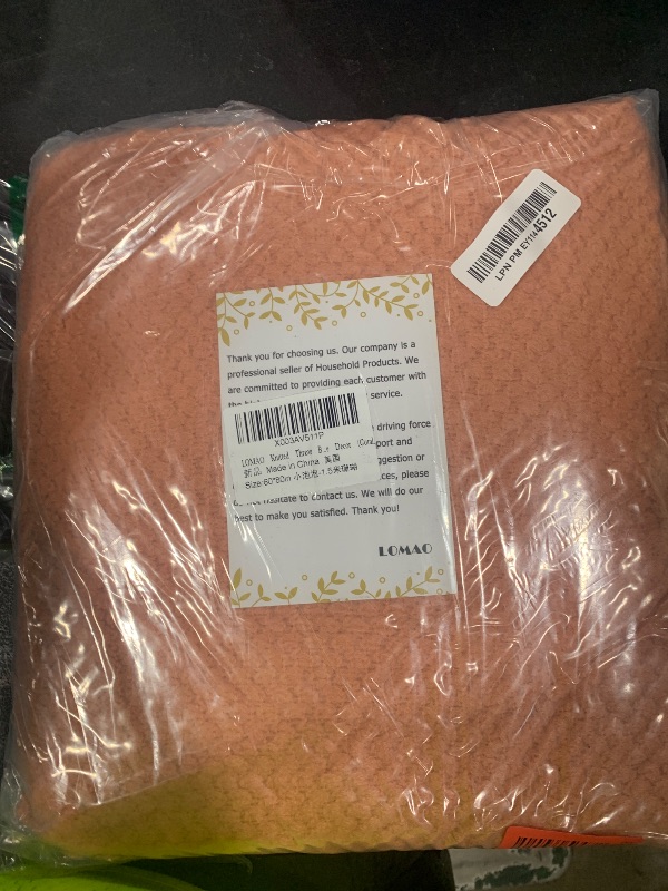 Photo 1 of LOMAO Knitted Throw Blanket with Tassels Bubble Textured Lightweight Throws for Couch Cover Home Decor (Coral, 60x80)