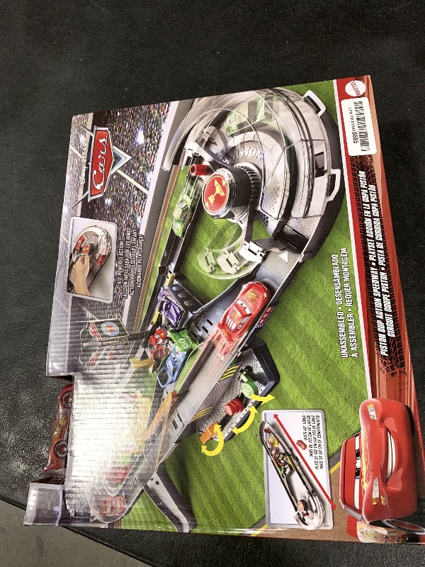 Photo 1 of Mattel Disney and Pixar Cars Track Set, Piston Cup Action Speedway Playset with Lightning McQueen Toy Race Car, Wind-Up Booster
