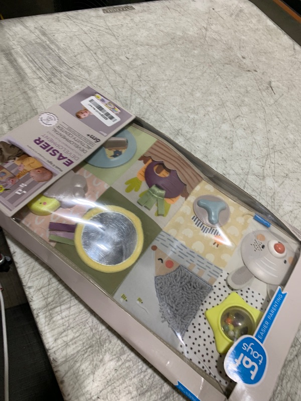 Photo 1 of Taf Toys Newborns & Toddlers Busy Board with Music & Lights 13 Montessori Activities Baby Safe Mirror, 3D Activities, Textures & a Baby Teether Develops Motor Skills, Senses & Eye Hand Coordination