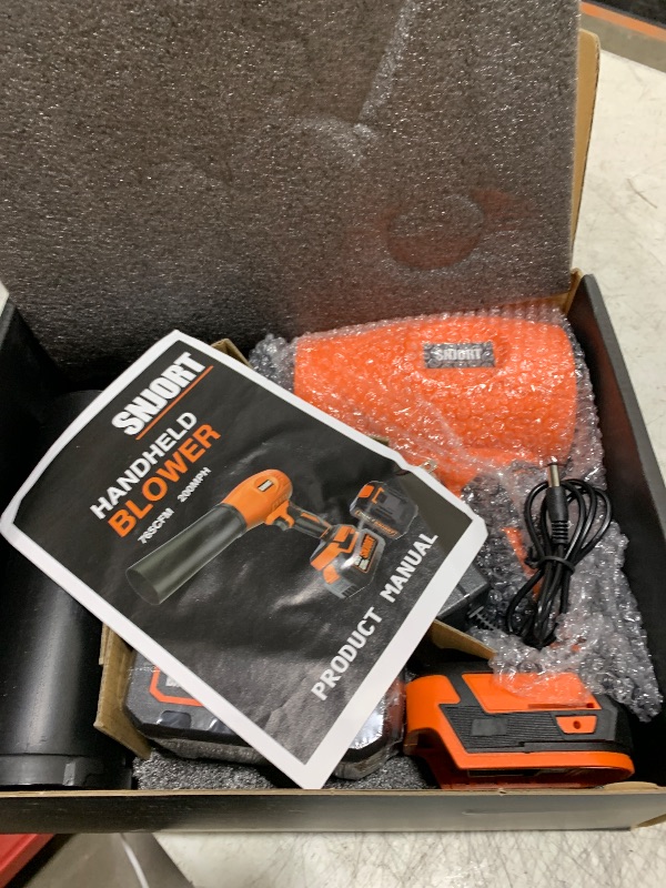 Photo 1 of Leaf Blower Cordless with Battery and Charger,500,000 RPM,Extended Nozzle,Lightweight Handheld Design,Blower for Patio Cleaning,car Blowing Water,Blowing Leaves and Dust (Bright Orange