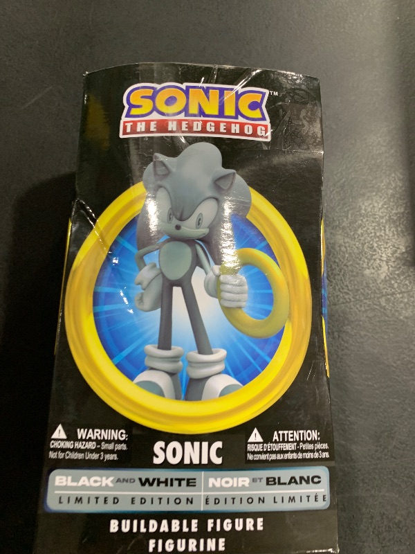 Photo 1 of Just Toys LLC Sonic The Hedgehog Buildable Figure, Black & White Limited Edition – 4? Collectible Toy with Moveable Arms & Accessories (Gold Ring & Chaos Emerald)