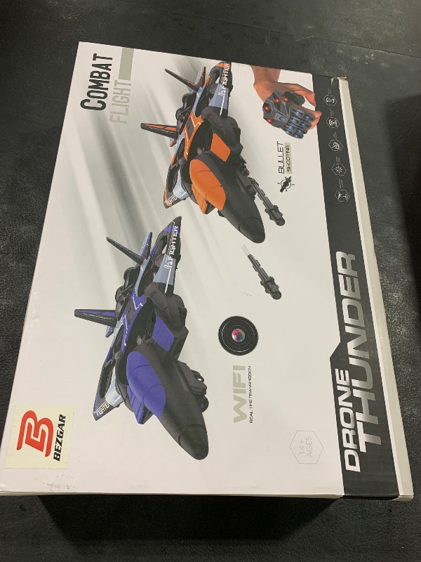 Photo 1 of BEZGAR RC Plane for Kids | 2.4GHZ Brushless Drones with Camera, 6-axis Gyro Remote Control Airplane, 360° Flip Fighter Jet Toy, Toys for Ages 8+ with Colorful LED Navigation Lights Orange