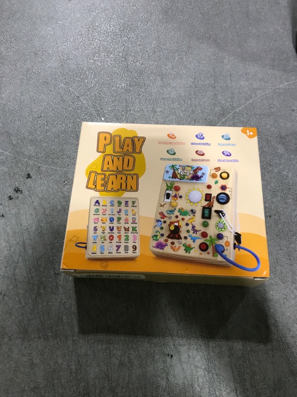Photo 1 of Iabedi Dinosaur Busy Board, Wooden Toddler Toy, Sensory Travel Toy, Ideal Gift for 1-3 Years Old Boys (Dinosaur Busy Board Plus V2), Blue