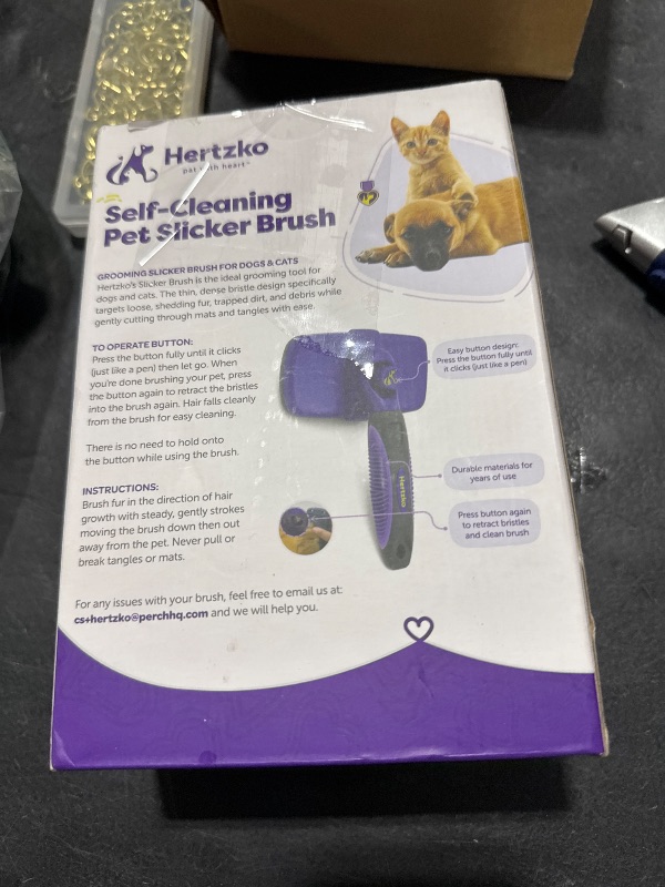 Photo 1 of Hertzko Self Cleaning Slicker Brush for Dogs and Cats - Pet Hair Brush for Shedding Long and Short Hair - Easy Clean Retractable Bristles - Cat and Dog Grooming Tool - Purple