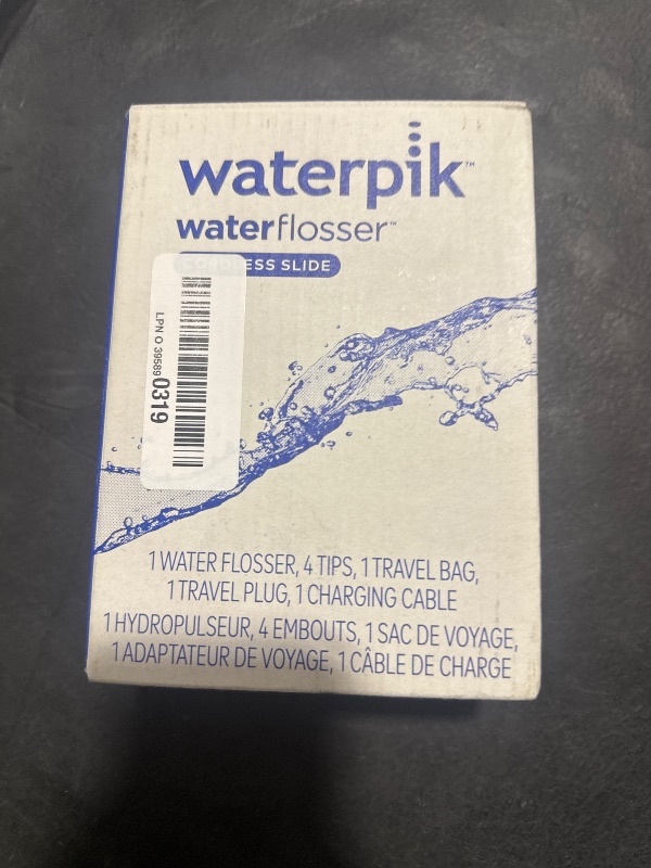Photo 1 of Waterpik Cordless Slide Professional Water Flosser, Portable Collapsible for Travel and Storage, with Travel Bag and 4 Tips, ADA Accepted, Rechargeable and Waterproof, White WF-17CD010-1