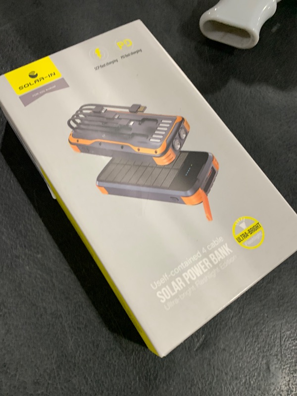 Photo 1 of MINRISE Solar Charger Power Bank, 40000mAh Portable Phone Charger Built in 4 Cables with USB C in/Output, PD 20W Fast Charging Portable Charger, External Battery Pack with Dual Bright Flashlights