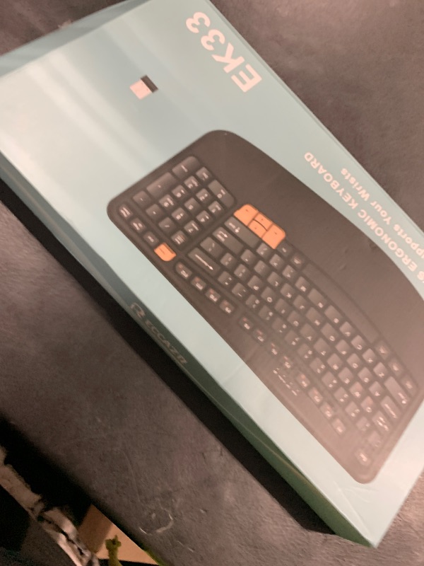 Photo 1 of Ergonomic Wireless Keyboard with Wrist Rest, Wave Keys for Comfortable Natural Typing, 2.4GHz Ergo Wireless Computer Keyboard for Windows, Mac OS Laptop/PC/Notebook (Black&Orange)