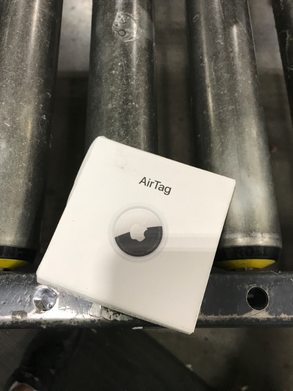 Photo 1 of Apple AirTag. Keep Track of and find Your Keys, Wallet, Luggage, Backpack, and More. Simple one-tap Set up with iPhone or iPad