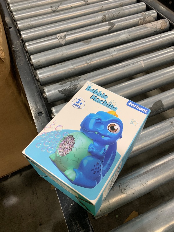Photo 1 of Dinosaur Bubble Machine Toys for Toddlers: Battery-Operated Bubble Maker with Bubble Solution for Kids - Perfect for Outdoor Parties, Yard Fun - Idea Kids Gift for Easter Christmas Birthday