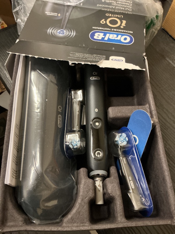 Photo 1 of Oral-B Rechargeable Electric Toothbrush, iO9 Limited Ultimate Clean, 7 Cleaning Modes, Interactive Display, iSense Charger, Charging Travel Case, Visible Pressure Sensor, 3 Brush Heads, Black