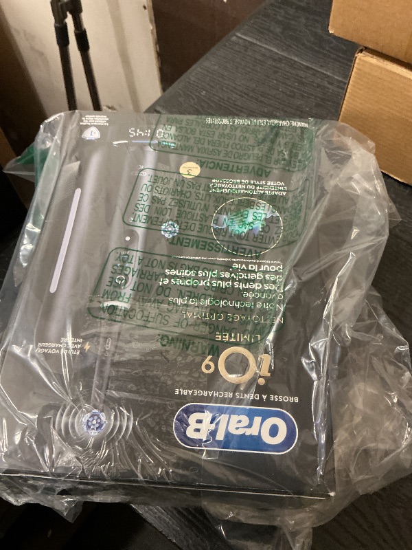 Photo 1 of Oral-B Rechargeable Electric Toothbrush, iO9 Limited Ultimate Clean, 7 Cleaning Modes, Interactive Display, iSense Charger, Charging Travel Case, Visible Pressure Sensor, 3 Brush Heads, Black