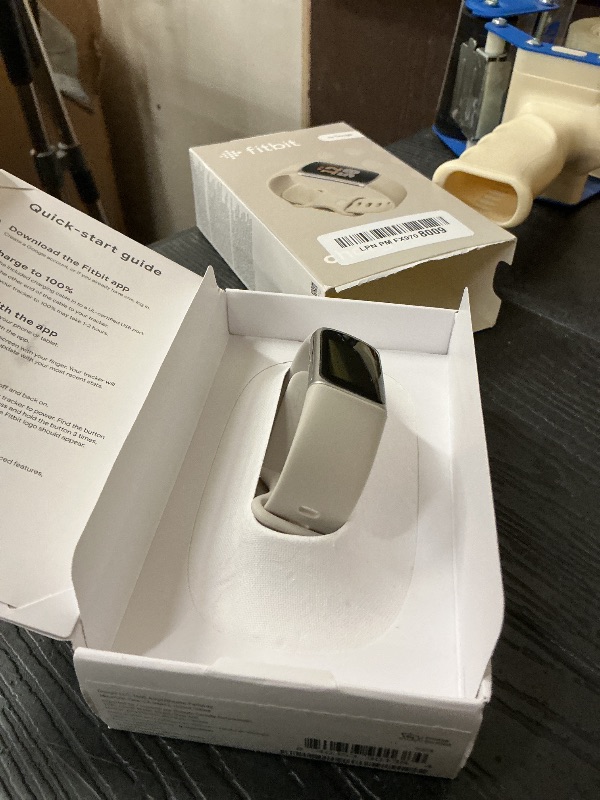 Photo 1 of Fitbit Charge 6 Fitness Tracker with Google apps, Heart Rate on Exercise Equipment, 6-Months Premium Membership Included, GPS, Health Tools and More, Porcelain/Silver, One Size (S & L Bands Included)
