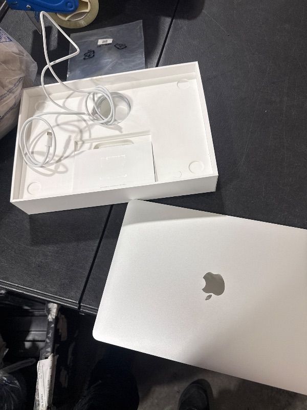Photo 1 of 2020 Apple MacBook Air Laptop: Apple M1 Chip, 13” Retina Display, 8GB RAM, 256GB SSD Storage, Backlit Keyboard, FaceTime HD Camera, Touch ID. Works with iPhone/iPad; Silver