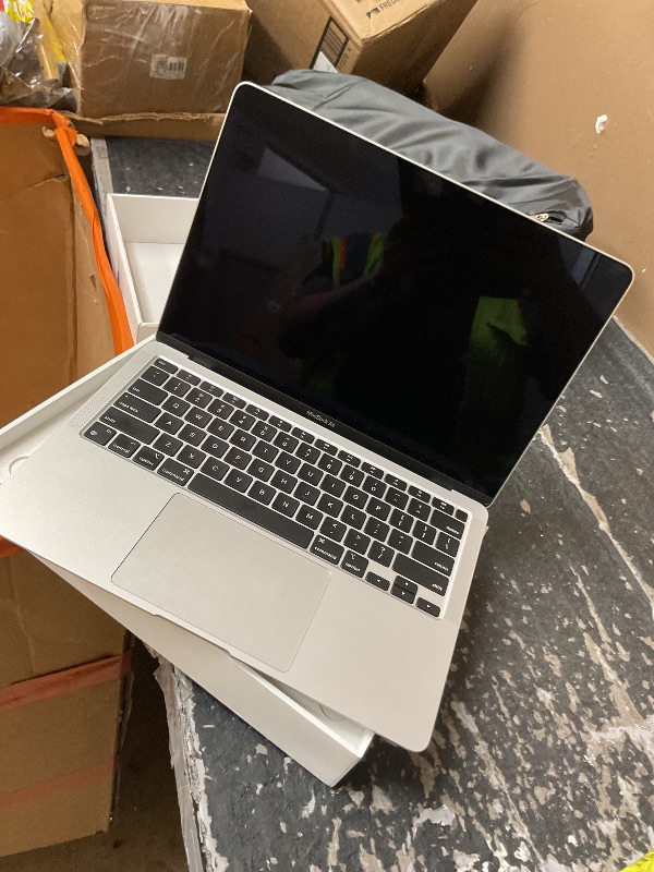Photo 1 of 2020 Apple MacBook Air Laptop: Apple M1 Chip, 13” Retina Display, 8GB RAM, 256GB SSD Storage, Backlit Keyboard, FaceTime HD Camera, Touch ID. Works with iPhone/iPad; Silver