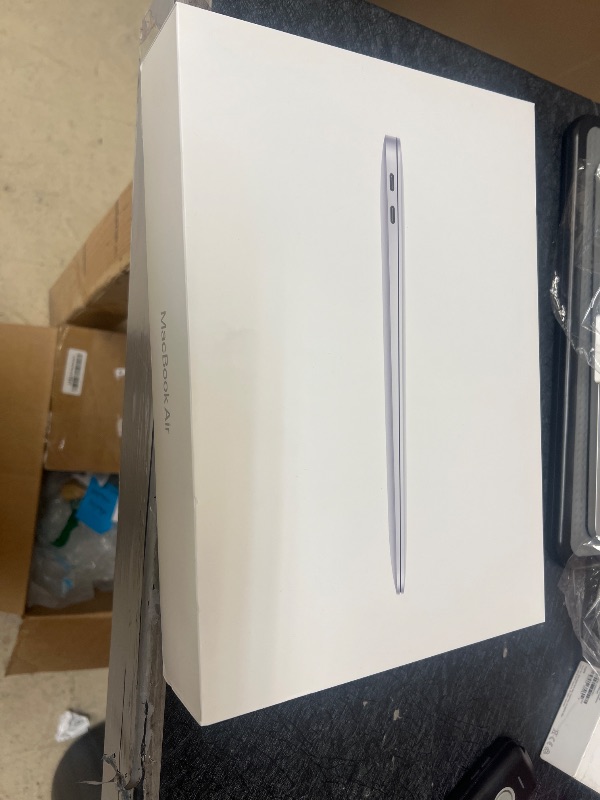Photo 1 of 2020 Apple MacBook Air Laptop: Apple M1 Chip, 13” Retina Display, 8GB RAM, 256GB SSD Storage, Backlit Keyboard, FaceTime HD Camera, Touch ID. Works with iPhone/iPad; Silver
