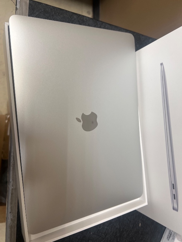 Photo 1 of 2020 Apple MacBook Air Laptop: Apple M1 Chip, 13” Retina Display, 8GB RAM, 256GB SSD Storage, Backlit Keyboard, FaceTime HD Camera, Touch ID. Works with iPhone/iPad; Silver