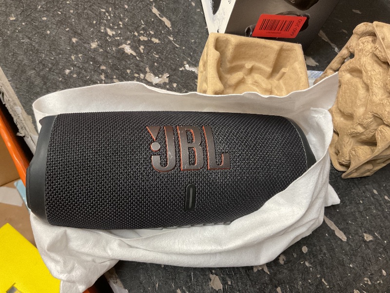 Photo 4 of JBL Charge 6 - Portable Waterproof & Drop-Proof Bluetooth Speaker, Bold JBL Pro Sound with AI Sound Boost, 28Hrs of Playtime, Built-in powerbank & Comes with a Sturdy/Removable Carrying Strap (Black)