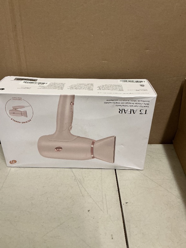 Photo 1 of T3 Afar Lightweight Travel-Size Hair Dryer with Auto Dual Voltage, Folding Handle, Fast Drying, Lightweight and Ergonomic, Frizz Smoothing, Multiple Heat and Speed Combinations