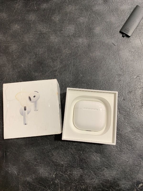 Photo 1 of Apple AirPods 4 Wireless Earbuds, Bluetooth Headphones, with Active Noise Cancellation, Adaptive, Transparency Mode, Personalized Spatial Audio, USB-C Charging Case, Wireless Charging, H2 Chip