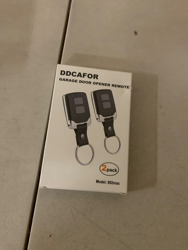 Photo 1 of 2 Garage Door Opener Remote, for Lift Master Chamberlain Craftsman Garage Door Opener Remote 893LM 893Max 891LM 971LM 973LM 371LM 373LM, Red Orange Green Yellow Purple Learn Button Garage Door Remote