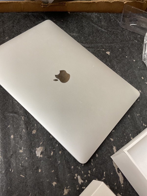 Photo 1 of 2020 Apple MacBook Air Laptop: Apple M1 Chip, 13” Retina Display, 8GB RAM, 256GB SSD Storage, Backlit Keyboard, FaceTime HD Camera, Touch ID. Works with iPhone/iPad; Silver
