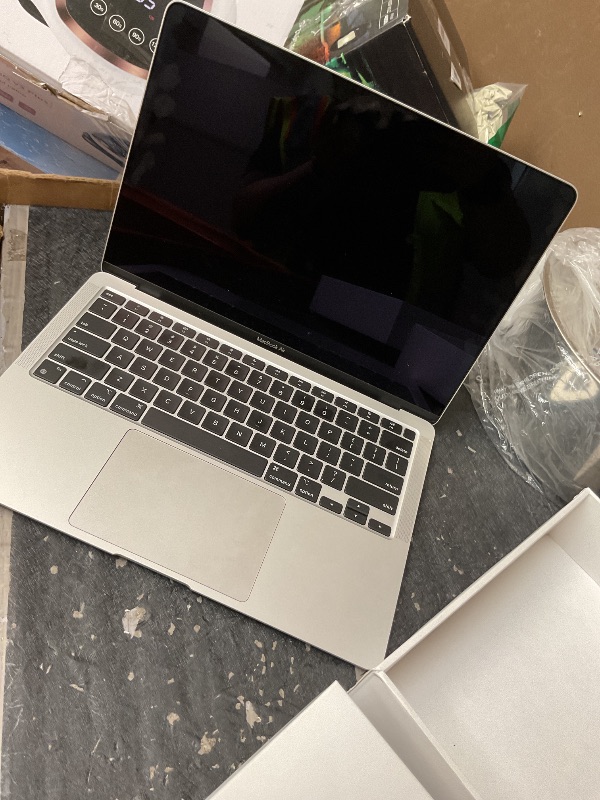 Photo 1 of 2020 Apple MacBook Air Laptop: Apple M1 Chip, 13” Retina Display, 8GB RAM, 256GB SSD Storage, Backlit Keyboard, FaceTime HD Camera, Touch ID. Works with iPhone/iPad; Silver