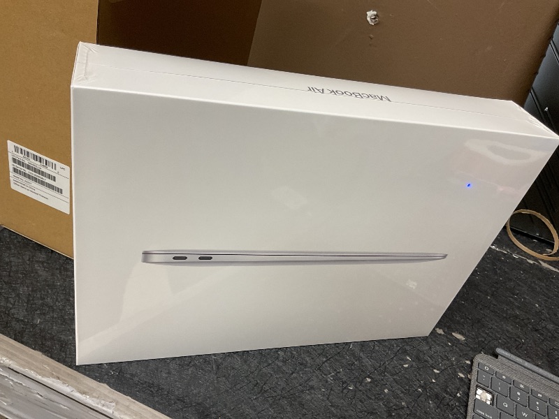 Photo 1 of 2020 Apple MacBook Air Laptop: Apple M1 Chip, 13” Retina Display, 8GB RAM, 256GB SSD Storage, Backlit Keyboard, FaceTime HD Camera, Touch ID. Works with iPhone/iPad; Silver