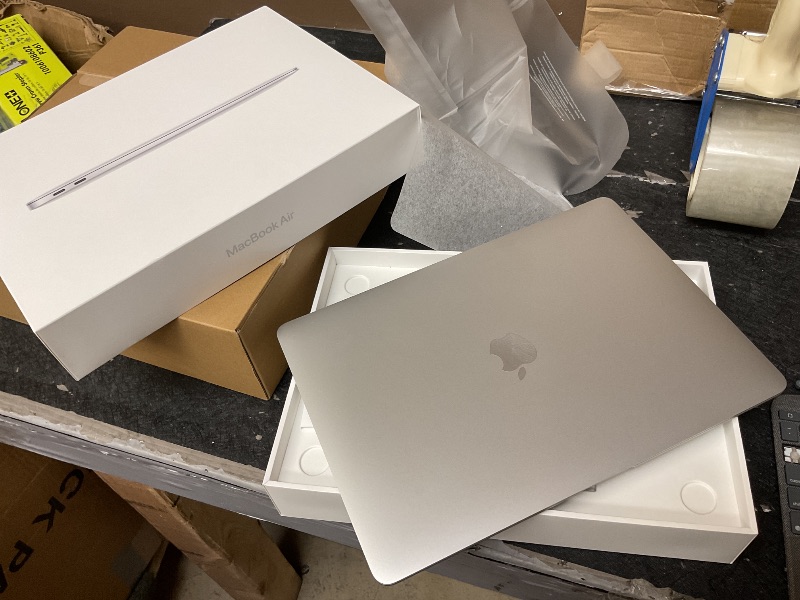 Photo 1 of 2020 Apple MacBook Air Laptop: Apple M1 Chip, 13” Retina Display, 8GB RAM, 256GB SSD Storage, Backlit Keyboard, FaceTime HD Camera, Touch ID. Works with iPhone/iPad; Silver