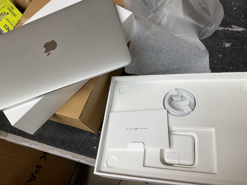 Photo 1 of 2020 Apple MacBook Air Laptop: Apple M1 Chip, 13” Retina Display, 8GB RAM, 256GB SSD Storage, Backlit Keyboard, FaceTime HD Camera, Touch ID. Works with iPhone/iPad; Silver
