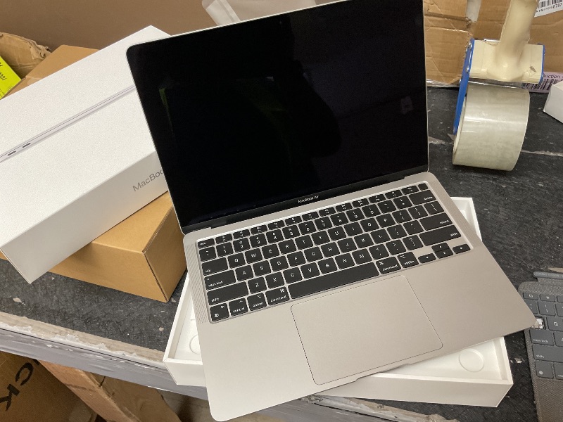Photo 1 of 2020 Apple MacBook Air Laptop: Apple M1 Chip, 13” Retina Display, 8GB RAM, 256GB SSD Storage, Backlit Keyboard, FaceTime HD Camera, Touch ID. Works with iPhone/iPad; Silver