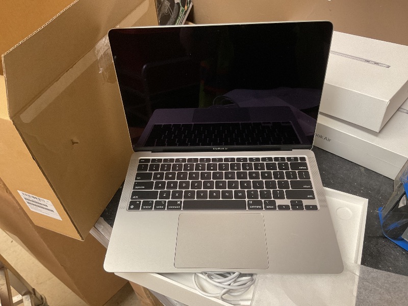 Photo 1 of 2020 Apple MacBook Air Laptop: Apple M1 Chip, 13” Retina Display, 8GB RAM, 256GB SSD Storage, Backlit Keyboard, FaceTime HD Camera, Touch ID. Works with iPhone/iPad; Silver