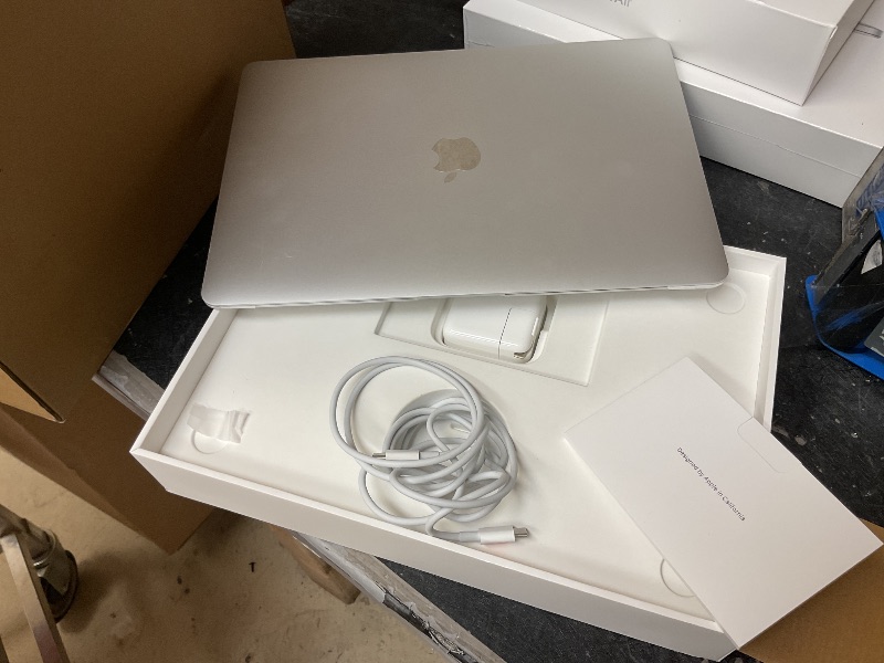 Photo 1 of 2020 Apple MacBook Air Laptop: Apple M1 Chip, 13” Retina Display, 8GB RAM, 256GB SSD Storage, Backlit Keyboard, FaceTime HD Camera, Touch ID. Works with iPhone/iPad; Silver