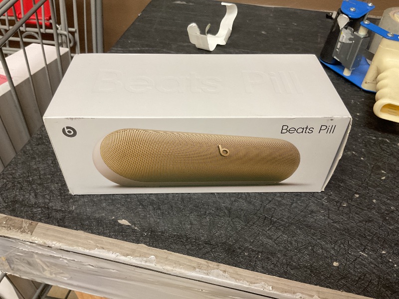 Photo 1 of Beats Pill - Portable Bluetooth Speaker- Up to 24H Battery Life, Water Resistant, Bluetooth, Apple & Android Compatible, Seriously Loud Sound for Home, Outdoor and Travel- Champagne Gold