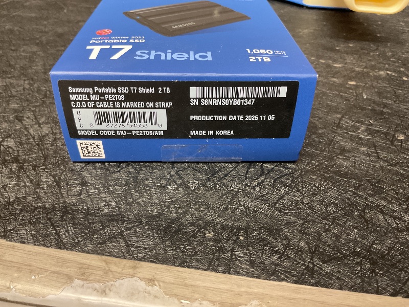 Photo 1 of Samsung T7 Shield 2TB, Portable SSD, up-to 1050MB/s, USB 3.2 Gen2, Rugged,IP65 Water & Dust Resistant, for Photographers, Content Creators and Gaming, Extenal Solid State Drive (MU-PE2T0S/AM), Black