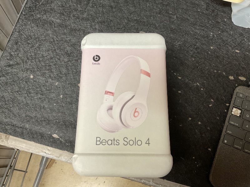 Photo 1 of Beats Solo 4 - Wireless On-Ear Bluetooth Headphones, Up to 50-Hour Battery Life, Ultra-Lightweight Comfort, Powerful and Balanced Sound, Apple & Android Compatible - Cloud Pink