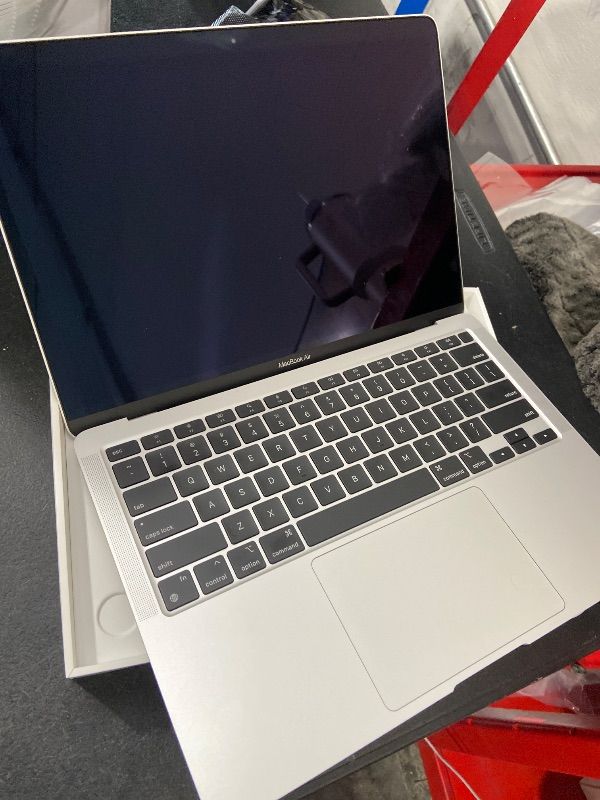 Photo 1 of 2020 Apple MacBook Air Laptop: Apple M1 Chip, 13” Retina Display, 8GB RAM, 256GB SSD Storage, Backlit Keyboard, FaceTime HD Camera, Touch ID. Works with iPhone/iPad; Silver