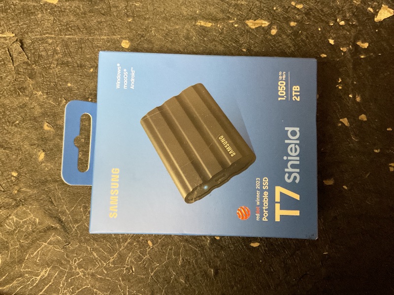 Photo 1 of Samsung T7 Shield 2TB, Portable SSD, up-to 1050MB/s, USB 3.2 Gen2, Rugged,IP65 Water & Dust Resistant, for Photographers, Content Creators and Gaming, Extenal Solid State Drive (MU-PE2T0S/AM), Black