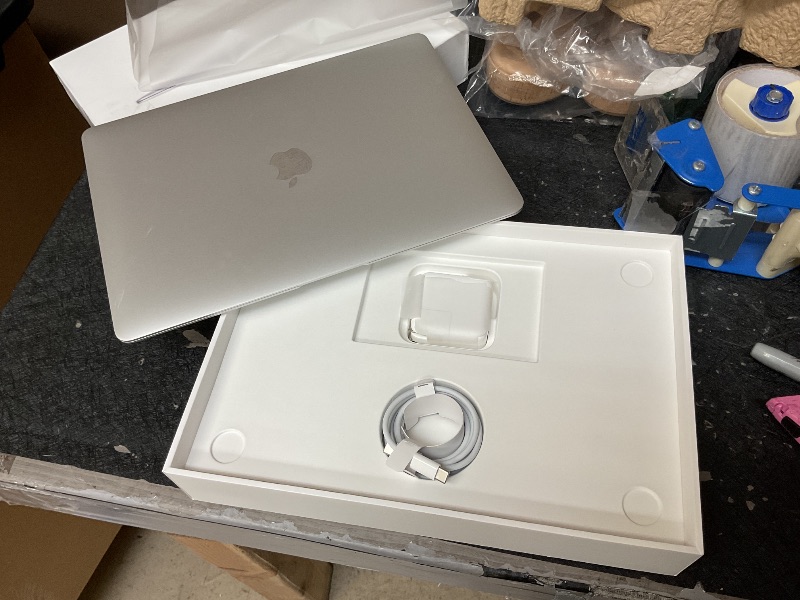 Photo 1 of 2020 Apple MacBook Air Laptop: Apple M1 Chip, 13” Retina Display, 8GB RAM, 256GB SSD Storage, Backlit Keyboard, FaceTime HD Camera, Touch ID. Works with iPhone/iPad; Silver