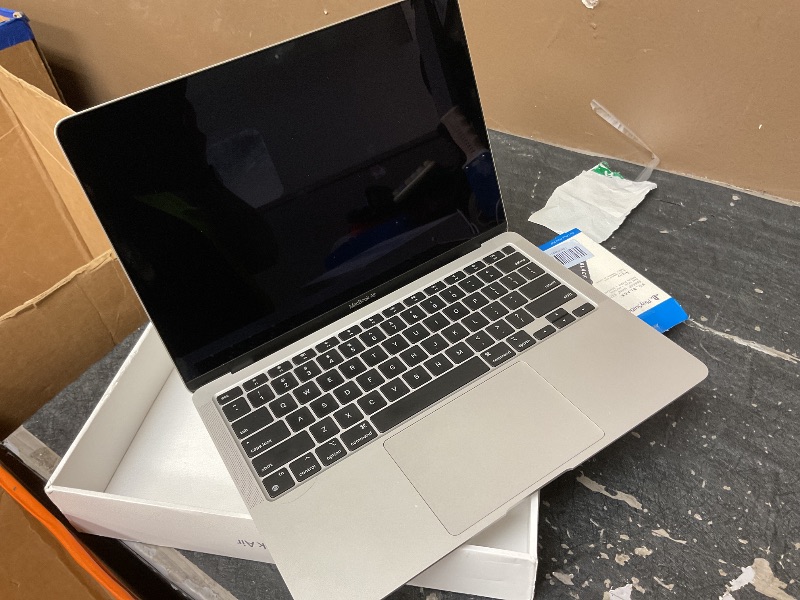 Photo 1 of 2020 Apple MacBook Air Laptop: Apple M1 Chip, 13” Retina Display, 8GB RAM, 256GB SSD Storage, Backlit Keyboard, FaceTime HD Camera, Touch ID. Works with iPhone/iPad; Silver
