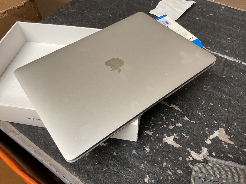 Photo 1 of 2020 Apple MacBook Air Laptop: Apple M1 Chip, 13” Retina Display, 8GB RAM, 256GB SSD Storage, Backlit Keyboard, FaceTime HD Camera, Touch ID. Works with iPhone/iPad; Silver